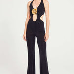 Black Jumpsuit With Gold Lining And Flower Details