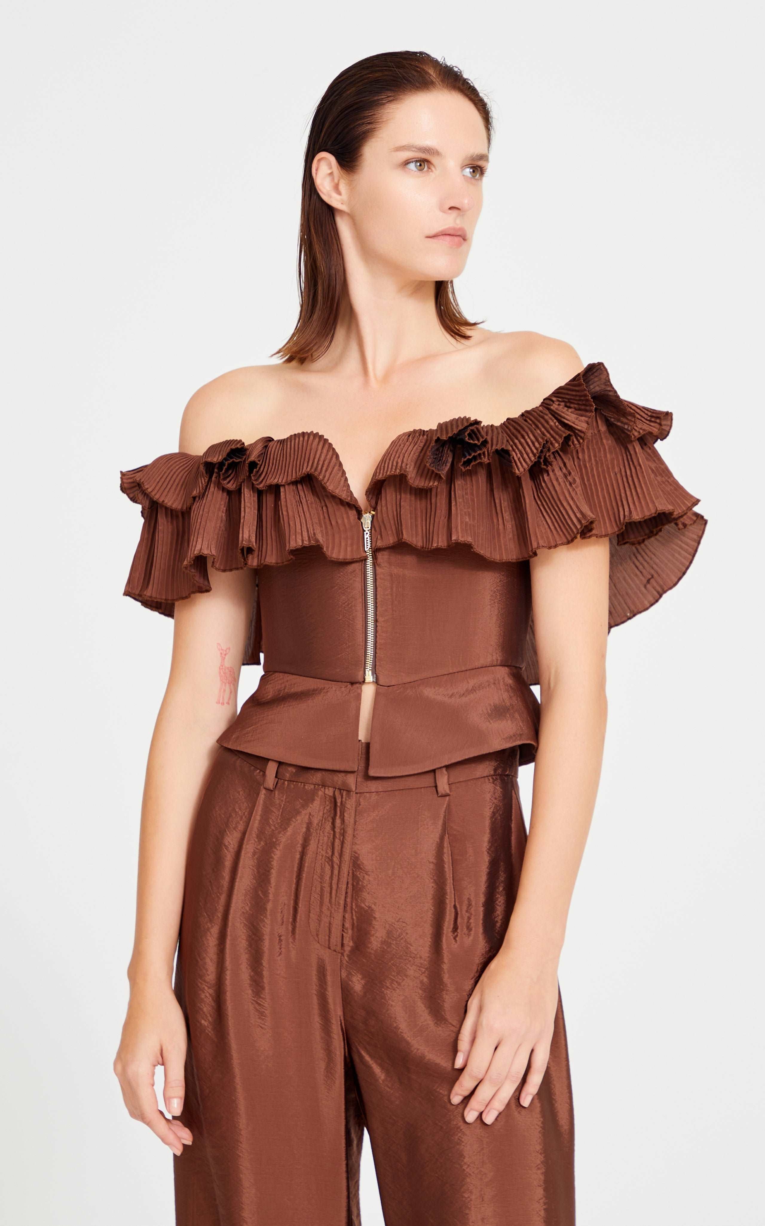 Brown Low Shouldered Top With Ruffle And Front Zipper Details