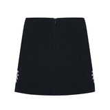 Black Crepe Mini Skirt With Patent Flower Detail