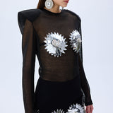 FW25-S-1005-Black-38 raisa_vanessa black-crepe-mini-skirt-with-patent-flower-detail