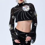FW25-T-1010-Black-38 raisa_vanessa black-sequined-chiffon-top-with-patent-flowers-and-flare-sleeves