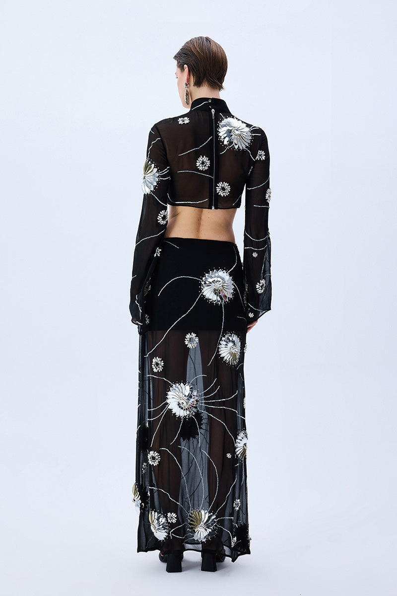 FW25-T-1010-Black-42 raisa_vanessa black-sequined-chiffon-top-with-patent-flowers-and-flare-sleeves
