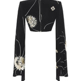 Black Sequined Jersey Top With Patent Flowers And Flare Sleeves