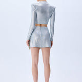 Metallic Knitted Mini Skirt With Patent Feathers