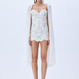 HC25-D-1005-White-34 raisa_vanessa crystal-chain-and-flower-embroidered-lace-mini-dress-with-chiffon-pleated-crystal-chain-with-cape