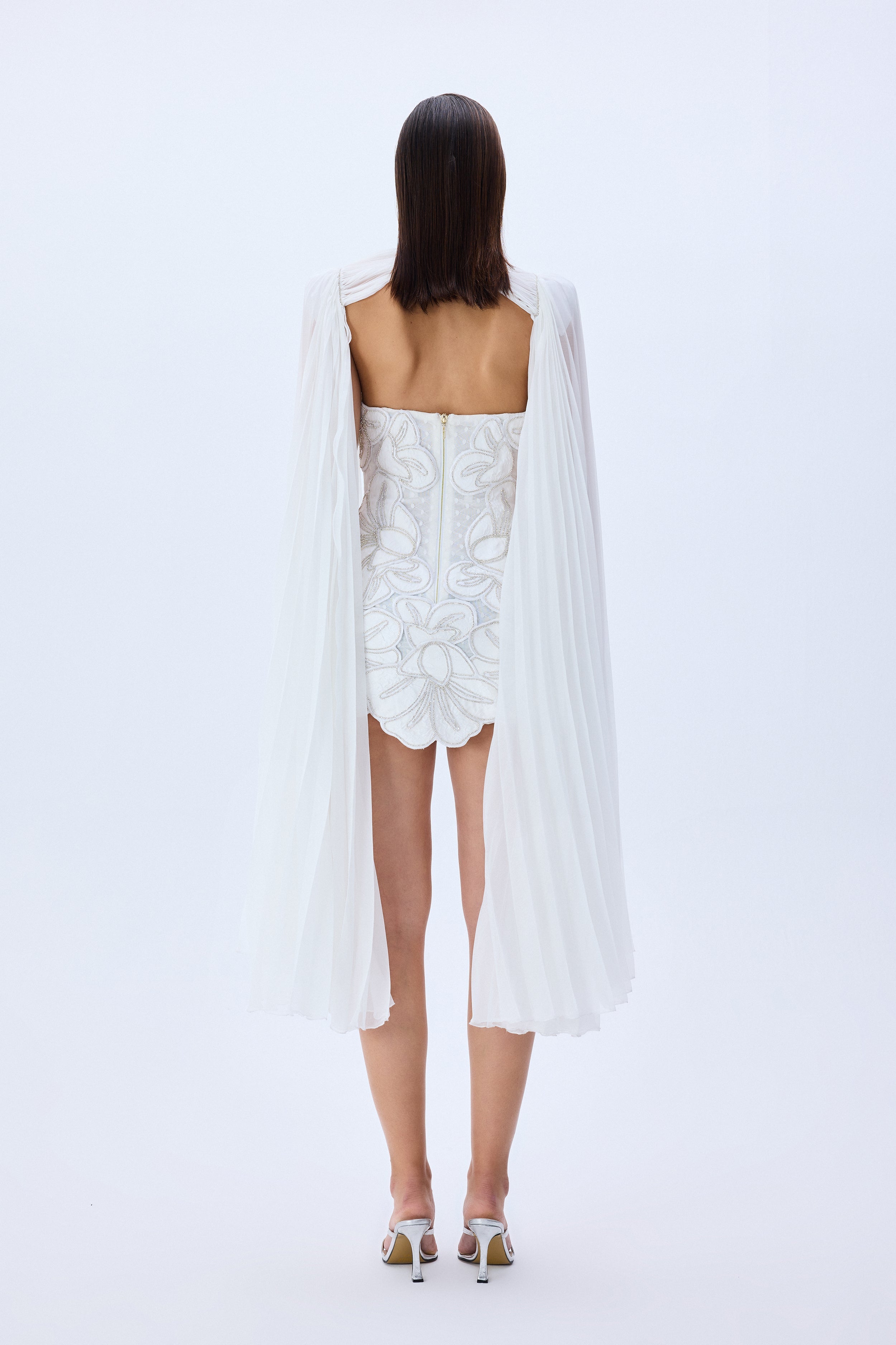 HC25-D-1005-White-42 raisa_vanessa crystal-chain-and-flower-embroidered-lace-mini-dress-with-chiffon-pleated-crystal-chain-with-cape