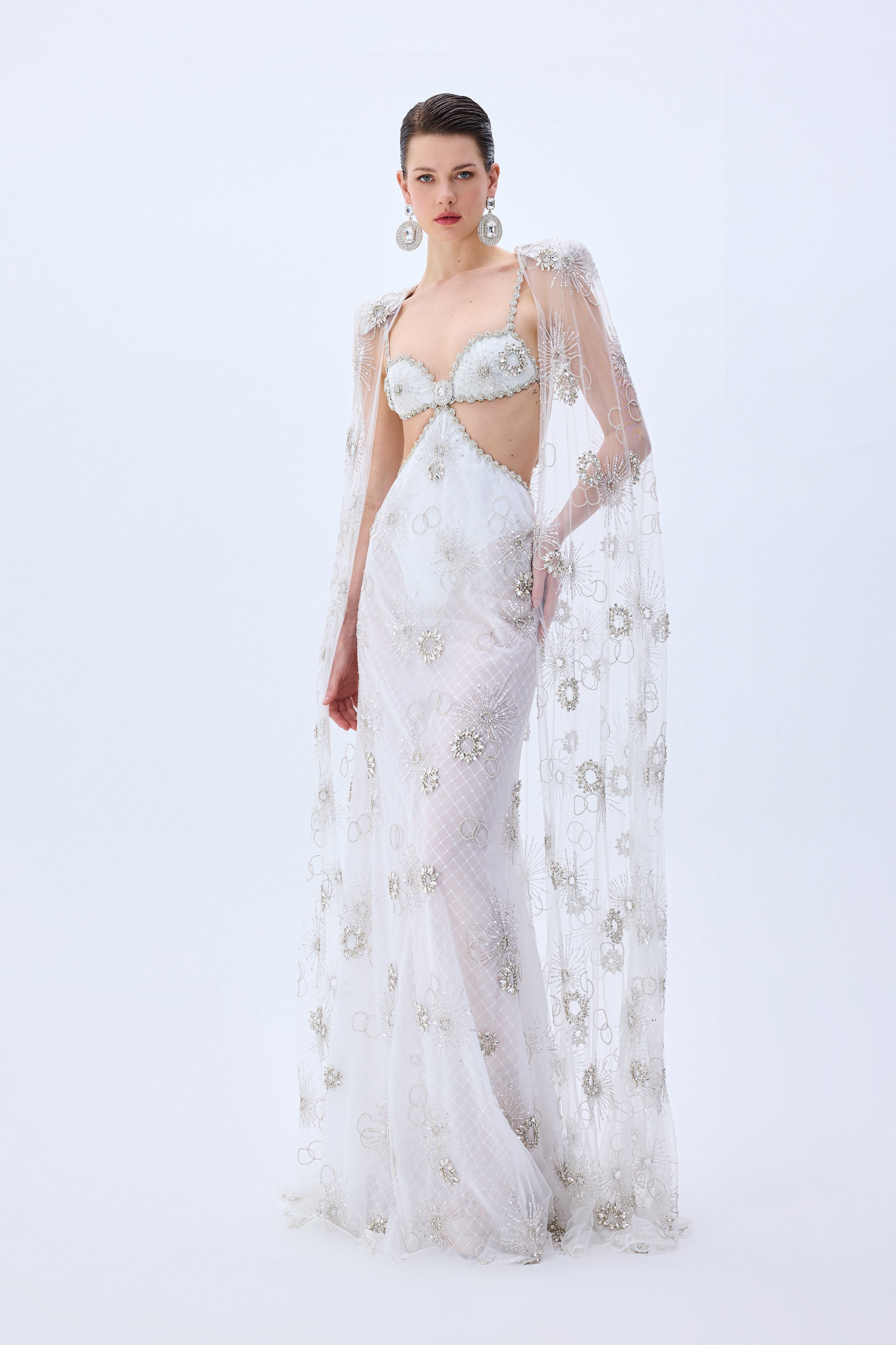 HC25-D-1008-White-36 raisa_vanessa crystal-emboridered-tulle-cut-out-gown-with-crystal-stoned-borders-and-tulle-cape-with-crystals