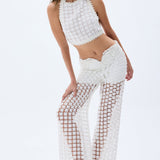 SS25-T-1002-white-36 raisa_vanessa white-floral-embroidered-top-with-strips
