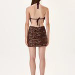 SS26-D-1023-38 raisa_vanessa mini-halter-neck-dress-with-gold-metal-strips