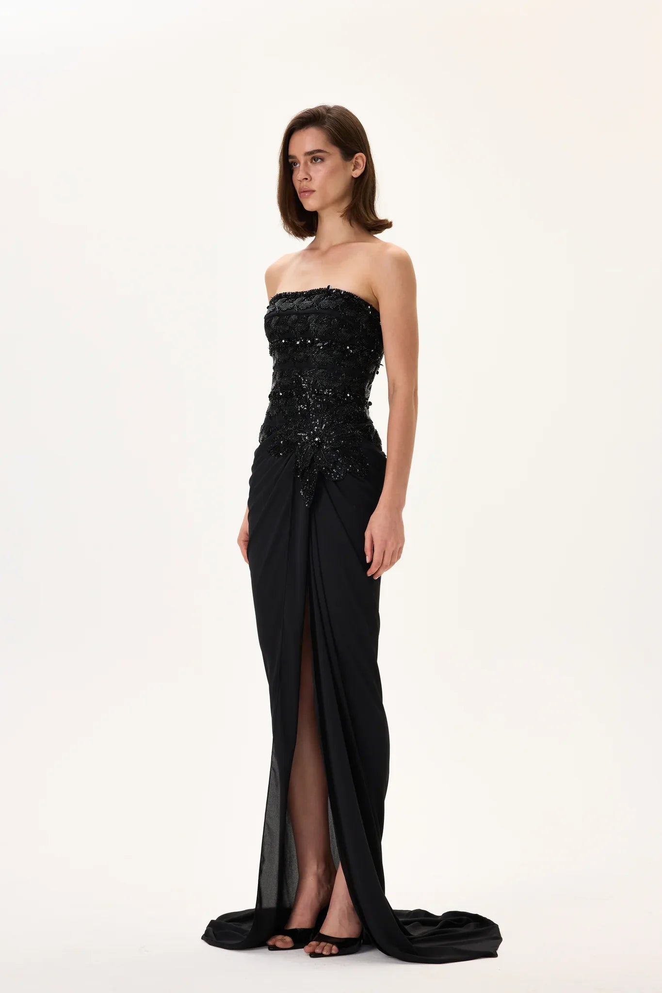 SS26-D-1049-36 raisa_vanessa black-gown-with-beaded-leaf-motive-striped-corset-top-and-fully-embroidered-flower-detail
