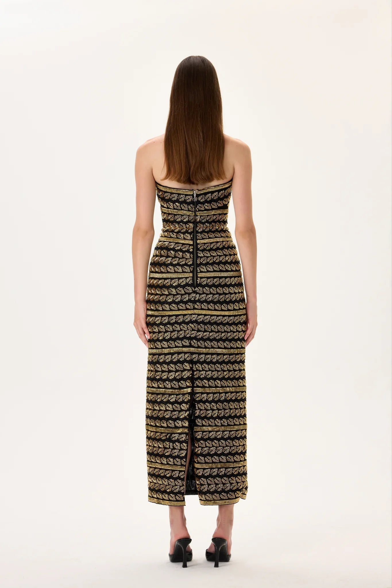 SS26-D-1050-38 raisa_vanessa black-midi-gown-with-gold-beaded-leaf-motive-strips