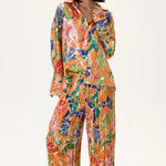 SS26-P-1009-1-34 raisa_vanessa orange-pleated-viscone-multi-color-flower-printed-wide-leg-pants-with-gold-foil-accents