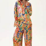 SS26-P-1009-1-34 raisa_vanessa orange-pleated-viscone-multi-color-flower-printed-wide-leg-pants-with-gold-foil-accents