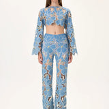 SS26-T-1002-34 raisa_vanessa denim-lace-crop-top-with-gold-metal-centered-flower-embroidery-sleeves