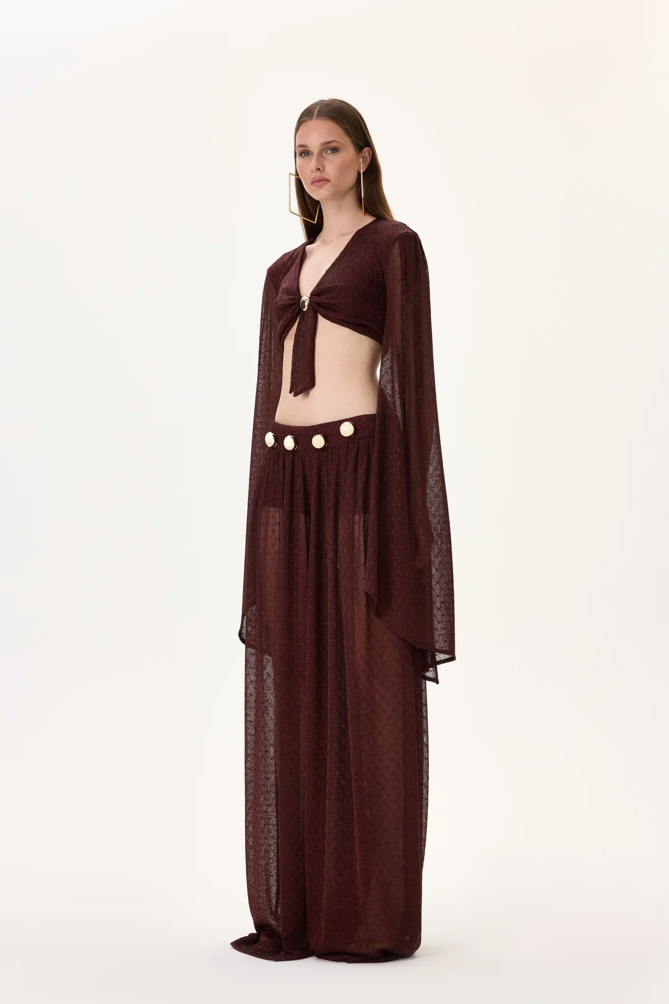 SS26-T-1017-36 raisa_vanessa knitted-burgundy-flare-sleeved-crop-top-with-gold-buckle-and-tie-detail