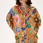 SS26-T-1019-40 raisa_vanessa orange-viscose-multi-color-flower-printed-shirt-with-gold-foil-accents