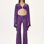 SS26-P-1015-34 raisa_vanessa multicolor-foil-printed-purple-jersey-flare-pants