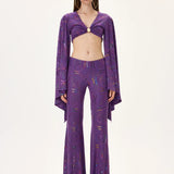 SS26-P-1015-34 raisa_vanessa multicolor-foil-printed-purple-jersey-flare-pants