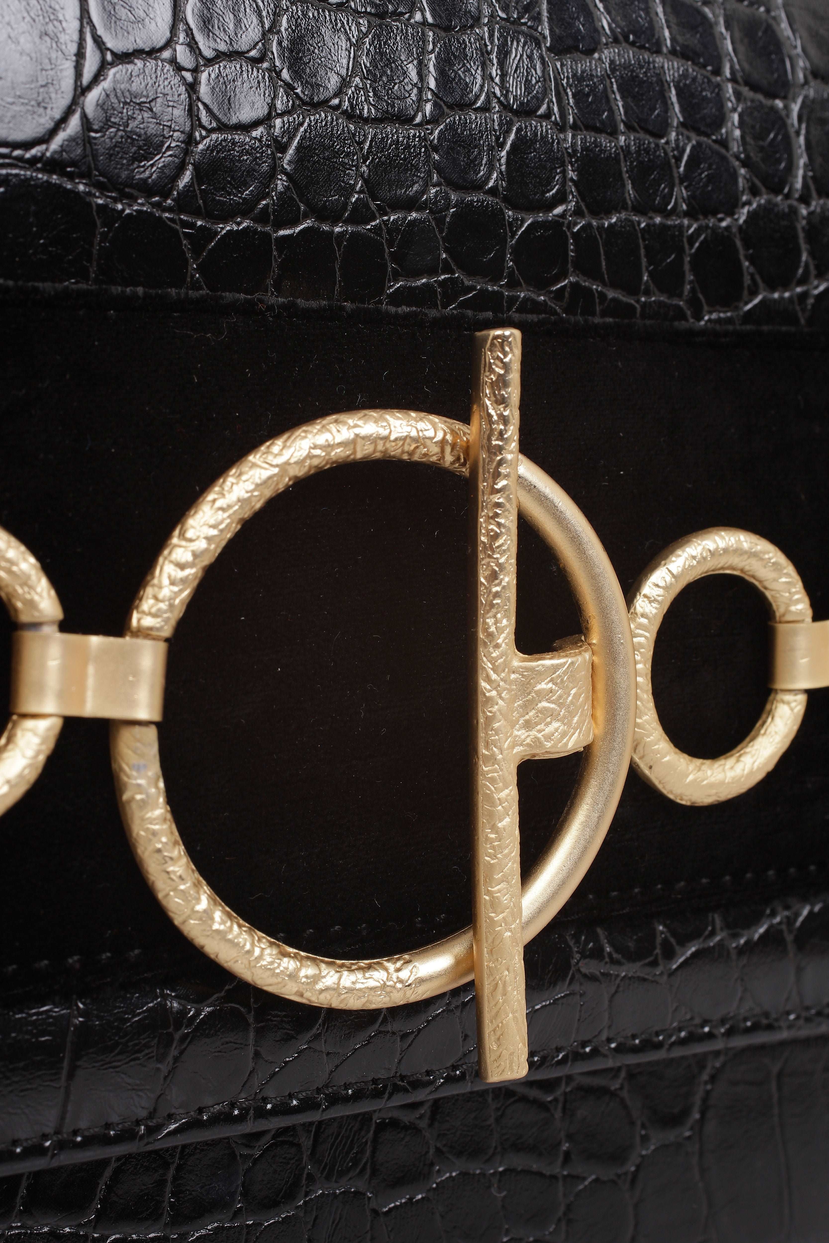 Black Rugan Handbag with Gold Metal Detail